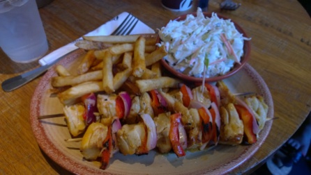 Enjoying a plate of goodness - the most moist and flavorful chicken can be found at Nando's!
